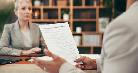 Business people, lawyer and documents with testimony for court justice, agreement or policy at office. Attorney, client and discussion with paperwork for case representation, legal law or evidence