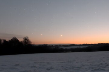 Serene Winter Sunset Landscape with Starry Sky over Snowy Field and Trees