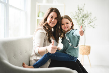 Obraz premium Portrait Of Loving Family Of Mom And daughter