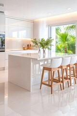 Fototapeta premium Modern white kitchen with island, seating, and large window offering tropical view