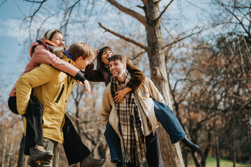 A cheerful group of friends shares laughs and fun while spending quality time in nature. The autumn season perfectly sets a cozy ambiance with its warm colors and inviting scenery.