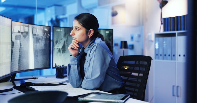 Security, thinking and woman on monitor in control room for surveillance, investigation and protection service. Law enforcement, computer screen and person for safety, inspection and observation