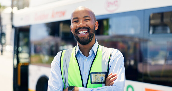 Arms crossed, bus driver and portrait of black man at station for commute, public transportation or service. Metro, smile and uniform with happy coach conductor outdoor for journey, tour or travel