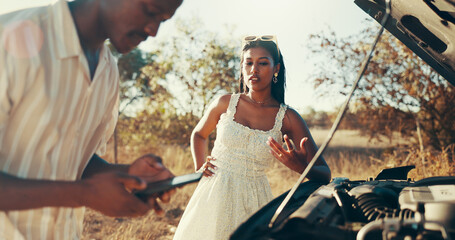Road, couple and phone for car breakdown with engine fail, gas or travel disaster, battery or stress. Man, smartphone and conversation for assistance, help and emergency or insurance claim for towing © KayContri01/peopleimages.com