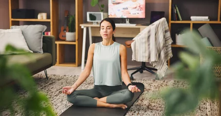 Fotobehang Lotusbloem Calm woman, meditation and healing with lotus for spiritual wellness or mindfulness at home. Female person, yogi or relax with inner peace or zen for stress relief, balance or awareness at house  © Azee/peopleimages.com