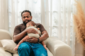  Loving Black Father Holding Baby.