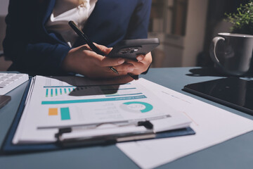 Expert woman asian female people review data number costing managerial account prepare monthly...