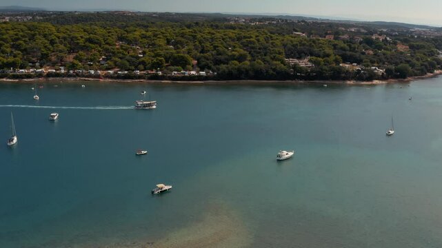 Drone aerial view of Mediterranean sea view with boats in a bay