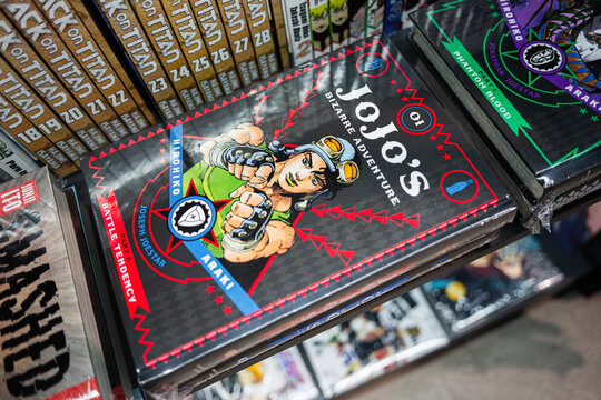 Bookshelf Display of Popular Manga including Jojo's Bizarre Adventure and Attack on Titan, Hirohiko Araki.