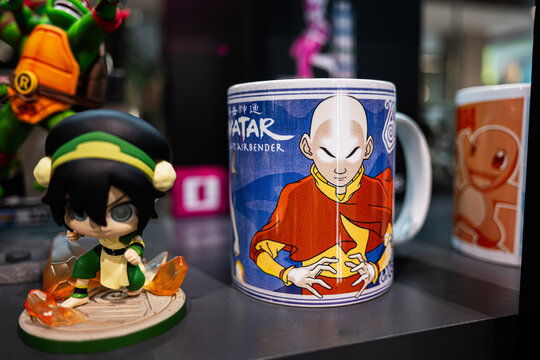 Avatar themed mug and figurine display featuring popular animated characters