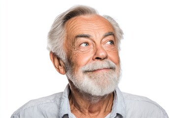 Elderly man with a grey beard and bright smile showing happiness and contentment against a white background