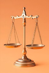 Ornate gold scales of justice on orange background