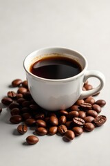 Obraz premium Fragrant coffee, white cup, roasted beans scattered, caffeine fix, warm