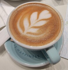 Cup of latte with latte art.
