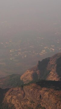 Mumbai, India. Badlapur, Savaroli, Maharashtra. Aerial View From plane Window On View of the Mumbai suburb district. Evening morning sunset sunrise light. residential district skyline cityscape