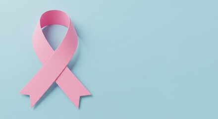 Pink ribbon symbol of breast cancer awareness and struggle on a light blue background, concept for health, support and medical campaigns. copy space.