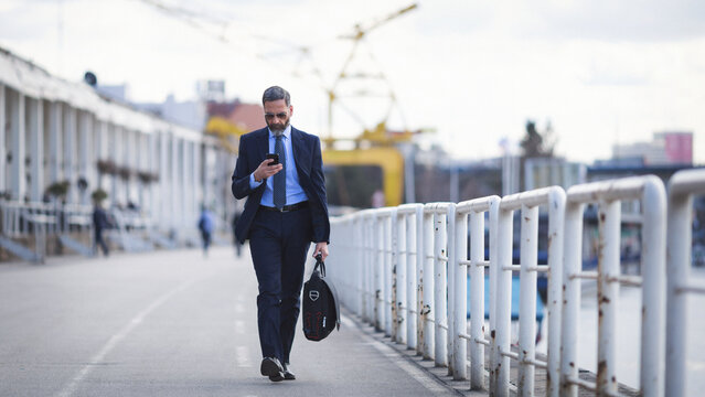 Senior businessman on the move