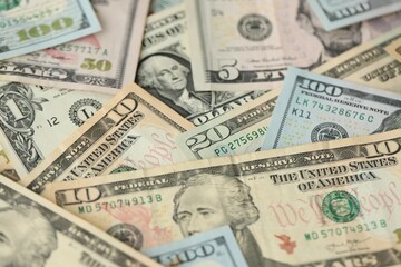 Stack of dollar bills. Hundred, fifty, twenty, ten, five dollars banknote close up