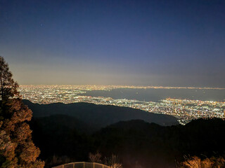 View the beautiful night view of Kobe, a Japanese port city, from the mountain