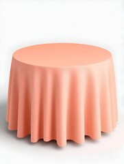 A coral-colored round tablecloth drapes elegantly over a circular table, showcasing a smooth, wrinkle-free surface