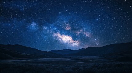 A peaceful night scene in the wilderness, with a clear sky full of stars and the Milky Way stretching across