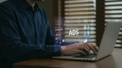 Looking up advertisements on a laptop. Image of considering marketing and advertising methods(Loop playback possible)
