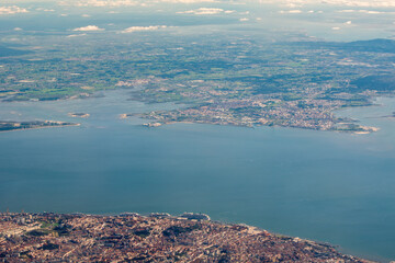Aerial view of the Tagus River and the old town of Lisbon from a plane, Lisbon, Portugal, Europe.