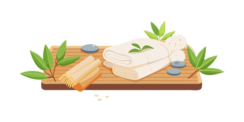 Bamboo tray with herbal towel and stones