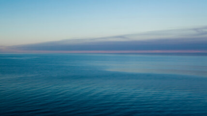 Obraz premium Serene ocean sunset breathtaking view tranquil waters peaceful evening sky
