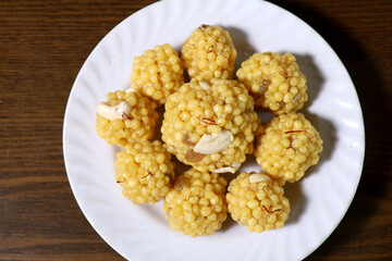 Traditional Indian Boondi Laddu on White Plate – Festive Sweet Delight