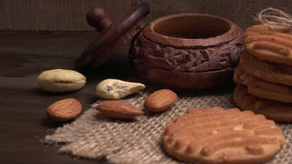 Tasty Cookies with sesame seeds on wooden board. Healthy vegan cookies.