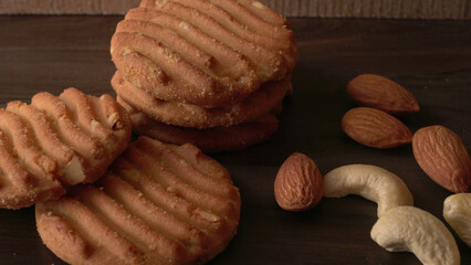 Tasty Cookies with sesame seeds on wooden board. Healthy vegan cookies.