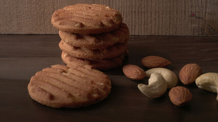 Tasty Cookies with sesame seeds on wooden board. Healthy vegan cookies.