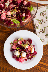 Low calorie salad with boiled beets and mozzarella cheese