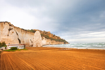 View of the Italian town of Vieste during a storm and cloudy weather. Sad atmosphere of the popular holiday destination Vieste.