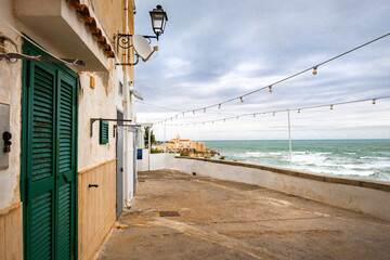 View of the Italian town of Vieste during a storm and cloudy weather. Sad atmosphere of the popular holiday destination Vieste.