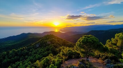 Fototapeta premium Breathtaking sunset over mountains and sea, showcasing vibrant colors and serene landscape.