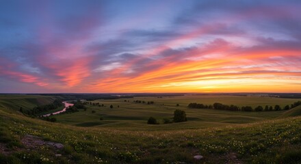 Obraz premium Dramatic Sunset over Rolling Landscape - Photo