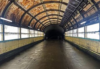Inside a seemingly abandoned train station in a rural area