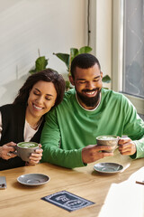 Joyful moments shared between an African American couple at a cozy cafe in the afternoon