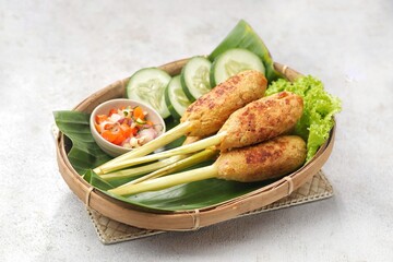 Sate Lilit is a variant of satay from Bali. This satay is made from pork, fish, chicken or beef, then mixed with grated coconut, coconut milk, lime, shallots and pepper.