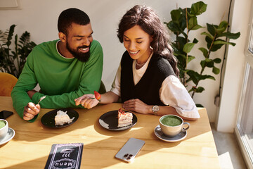 Couple enjoying a sweet moment together in a cozy cafe setting