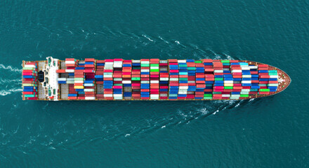 Top down aerial view fully loaded container ship sailing ocean international maritime trade. Cargo transportation, supply chain, shipping industry concept.