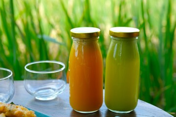 Fresh and healthy pressed juice in bottles. Made from blended vegetables and fruits. Jus sayur dan...