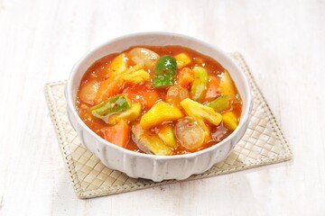 Rujak kweni or rujak aceh is a type of typical Acehnese rujak made from mashed kweni mango with chili, sugar, salt and tamarind juice.