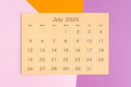 July 2026 calendar brown paper page on purple background.