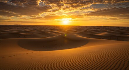 Desert Sand Dunes Landscape at Sunrise with Golden Sun and Cloudy Sky