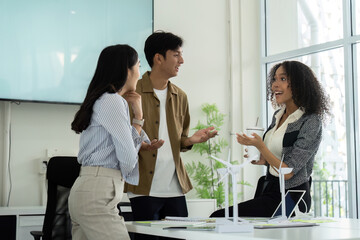 Sustainability teamwork: Professionals engaging in eco-friendly discussions