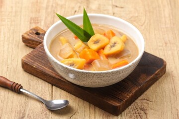 Kolak is a native Indonesian food made from bananas or sweet potatoes boiled with coconut milk and palm sugar.