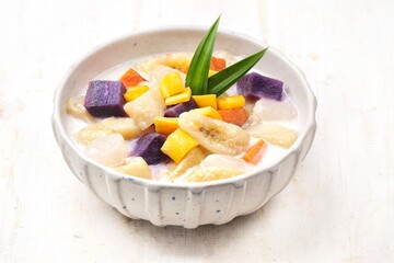 Kolak is a native Indonesian food made from bananas or sweet potatoes boiled with coconut milk and palm sugar.